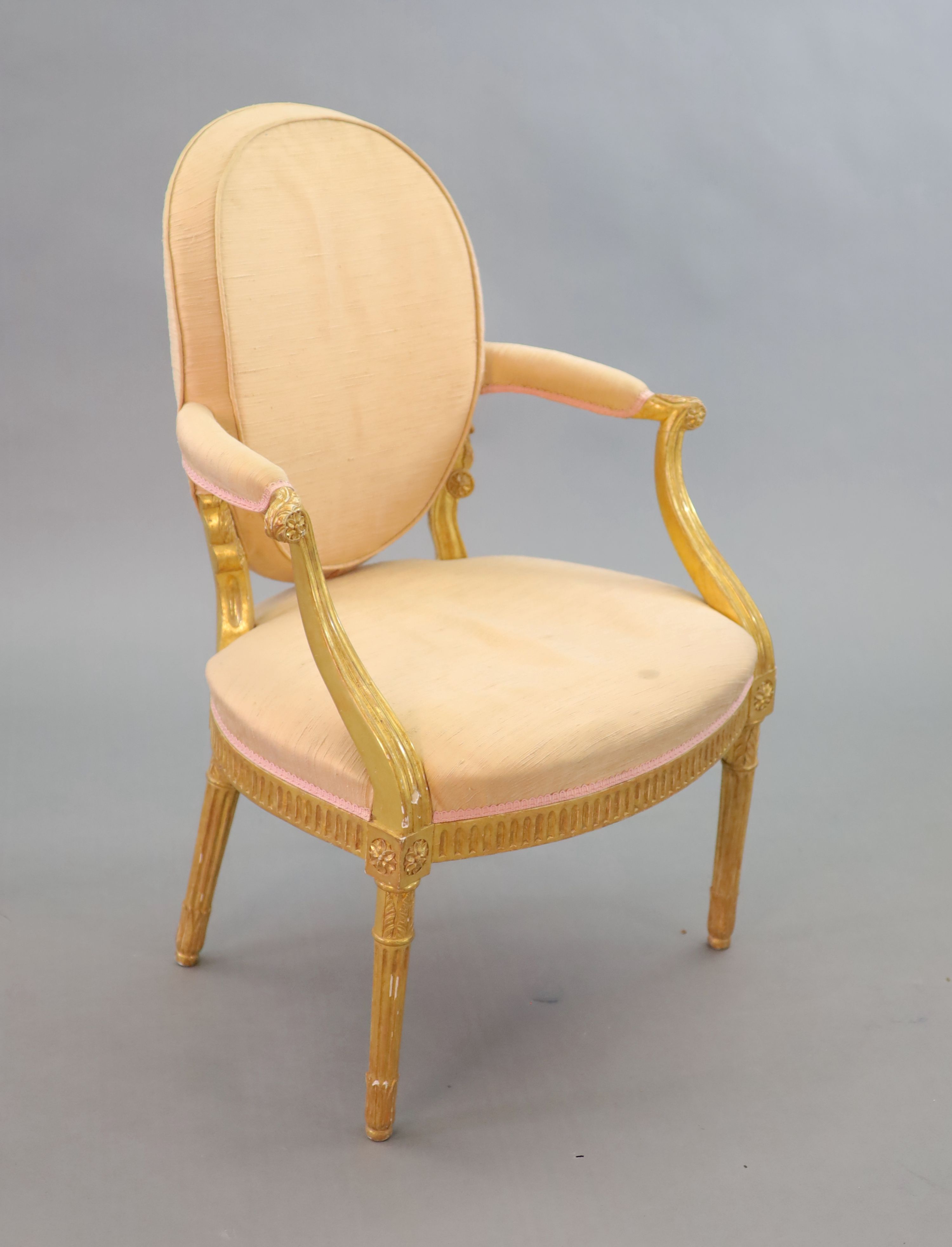 A George III giltwood open armchair, W.64cm H.90cm D.60cm